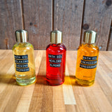 Huile de bain naturelle Wellmark : Flacons à l'onagre, à l'amande et à la grenade.