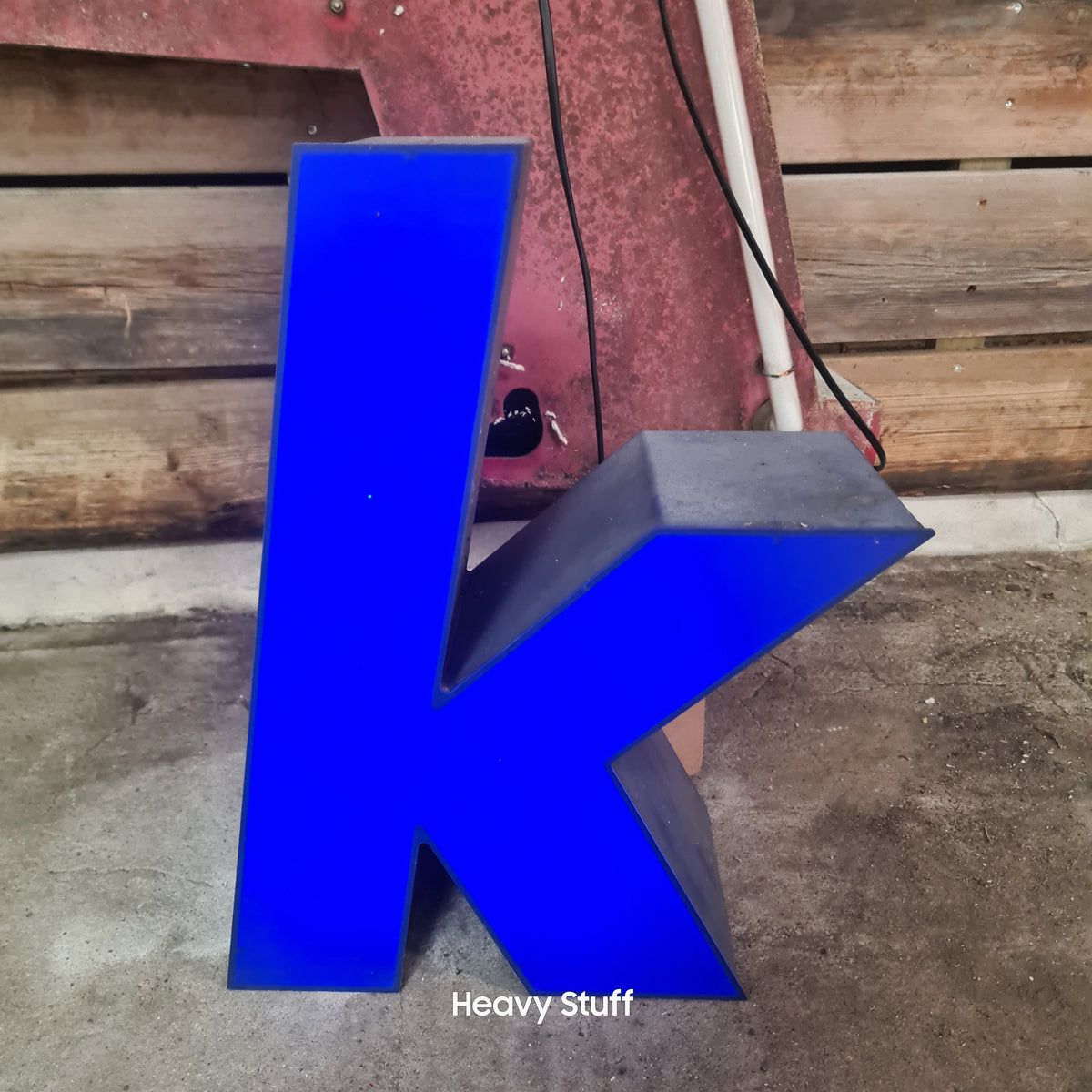 S Kleine dichte neon letter in blauw