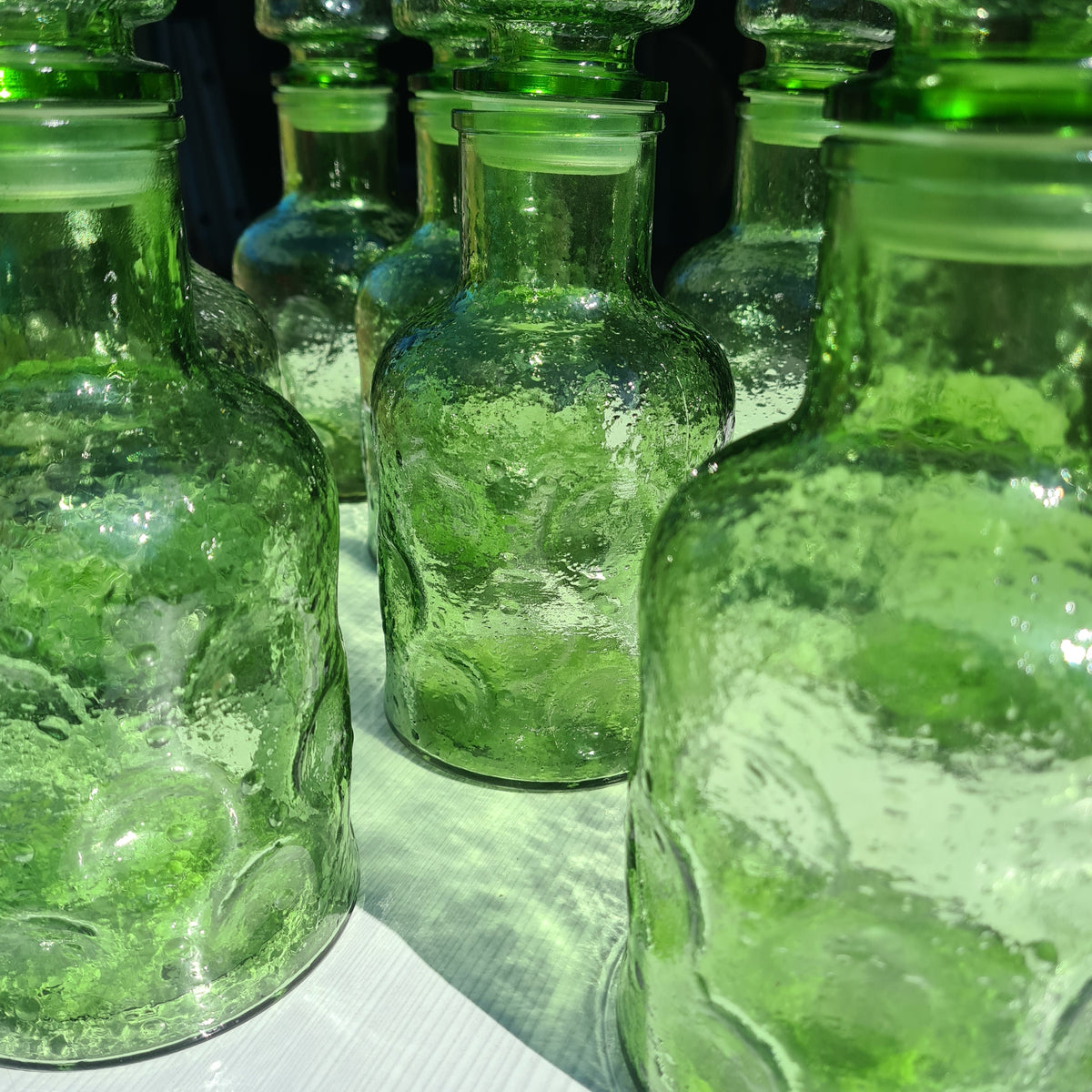 Karaf met stop van geknepen Empoli glas